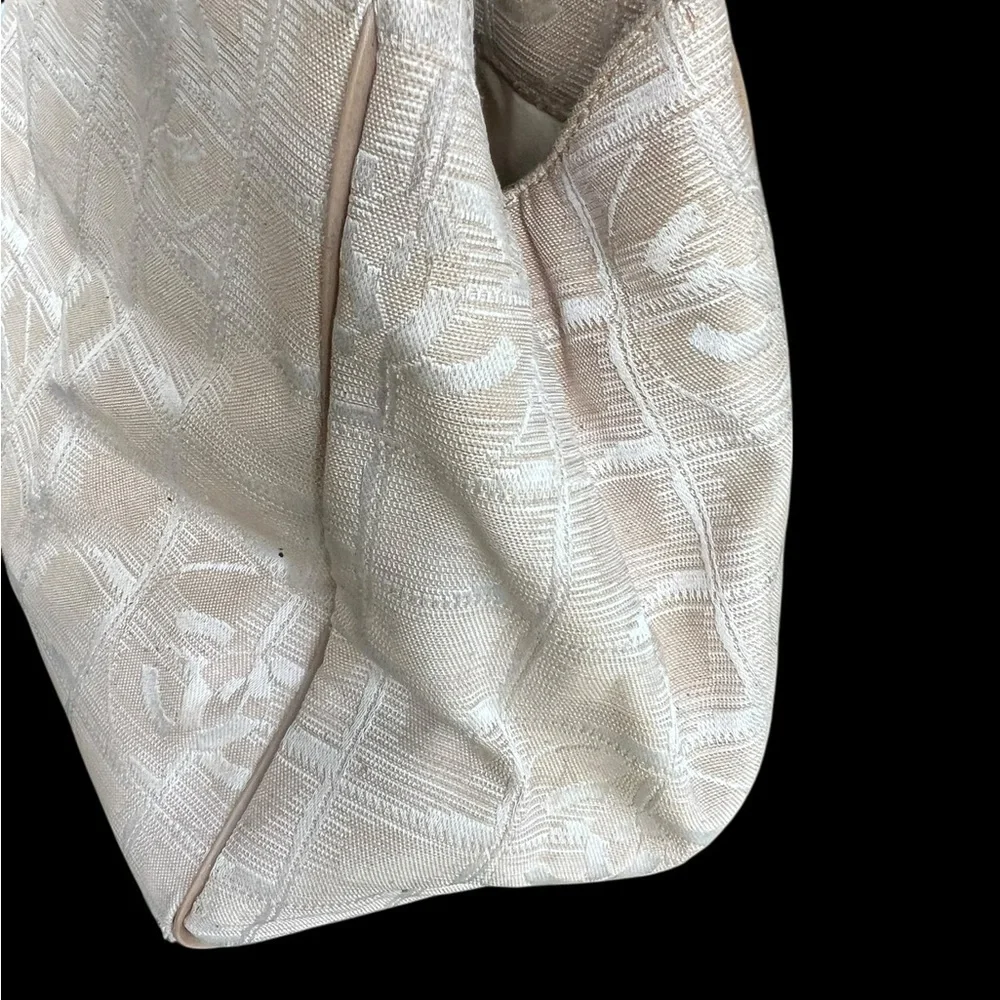 CHANEL Cream Canvas Travel Line